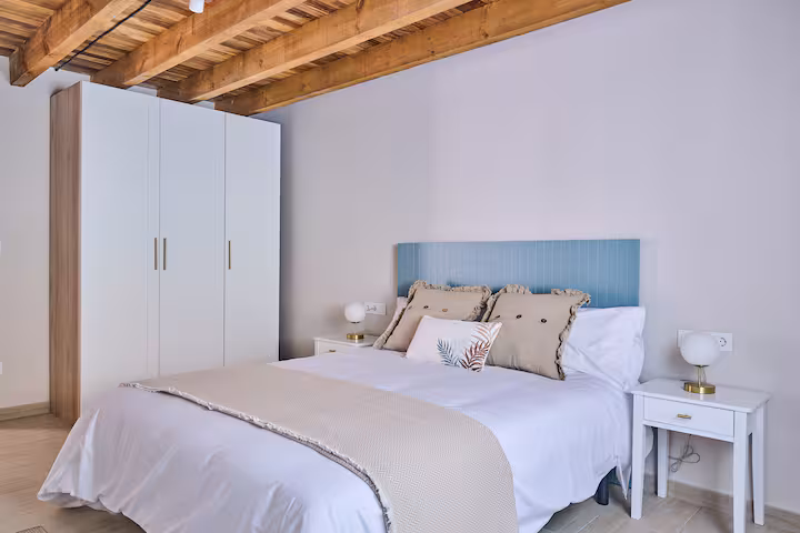 Photo: bedroom, duck-egg blue headboard