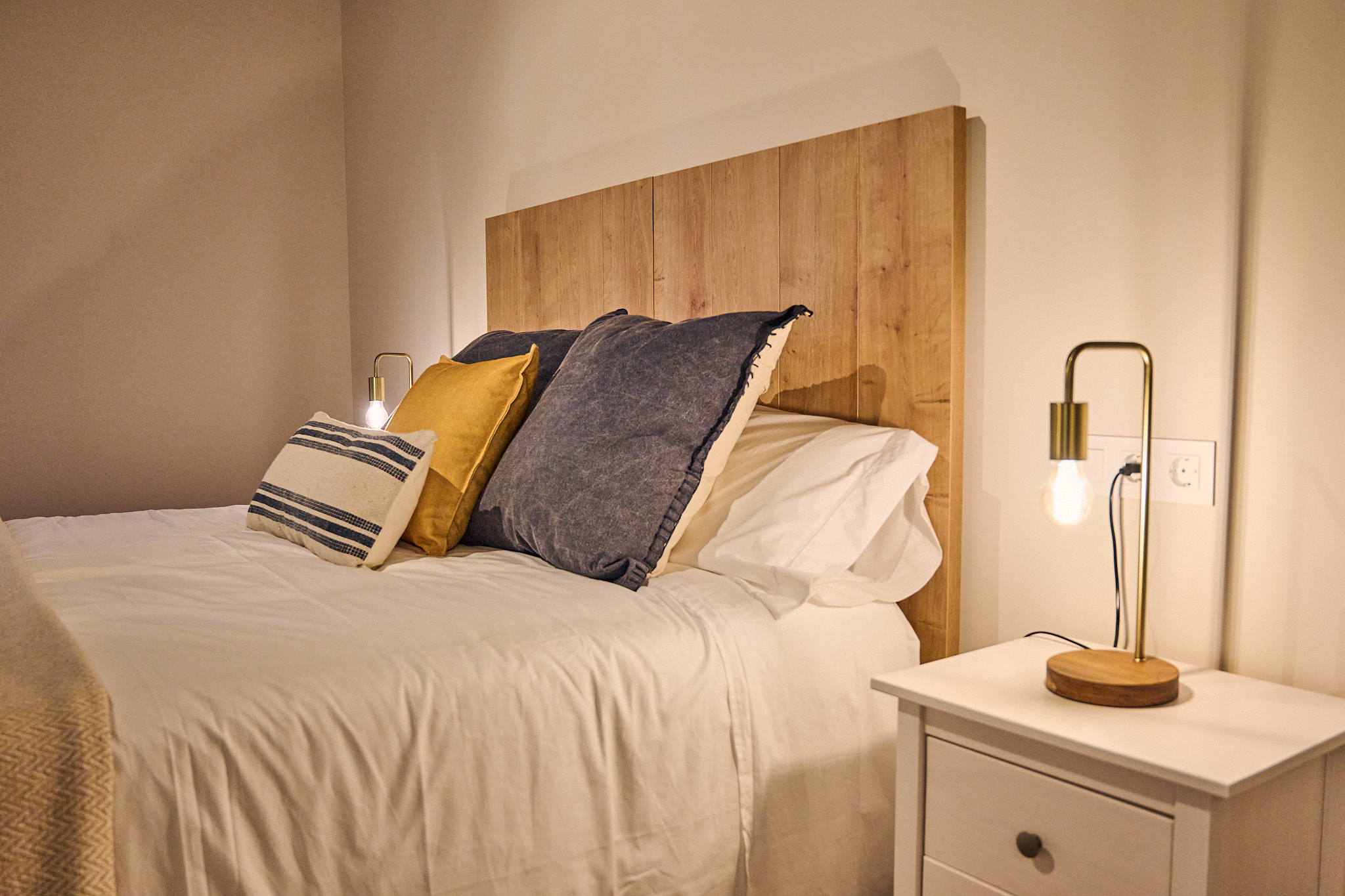 Photo: bedroom, navy & mustard accents, detail