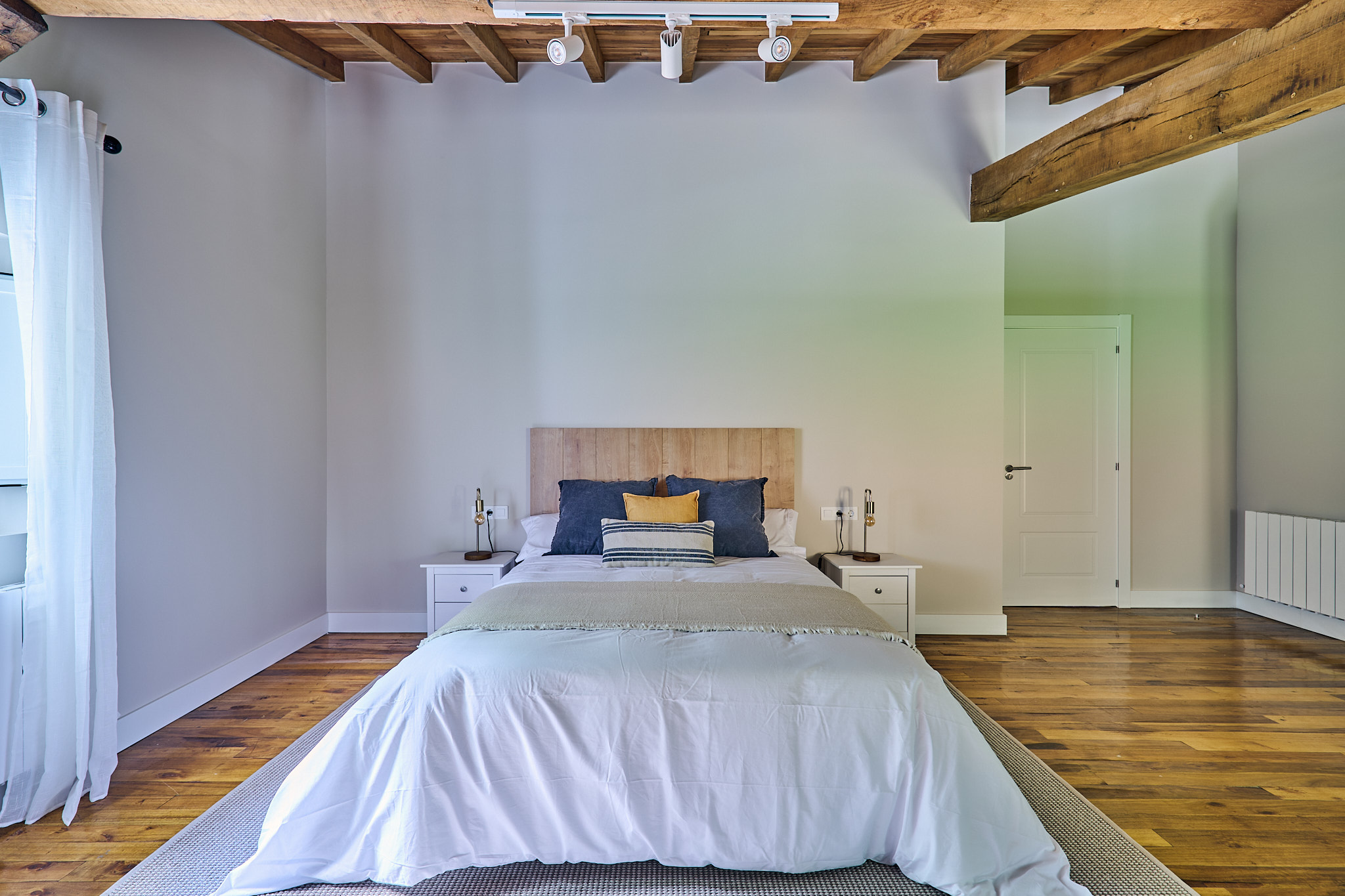 Photo: bedroom, navy & mustard accents