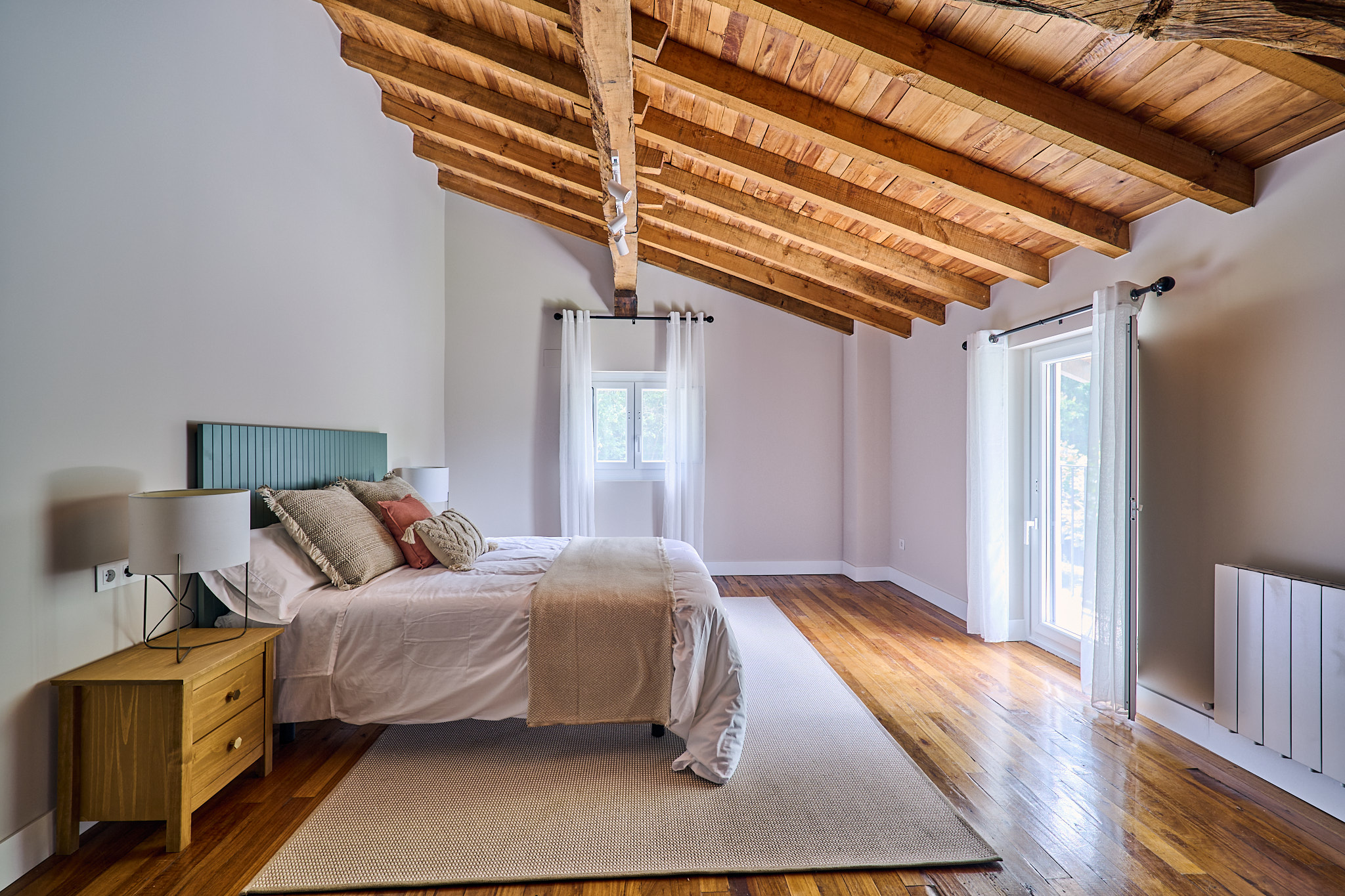 Photo: bedroom, vaulted wood ceiling
