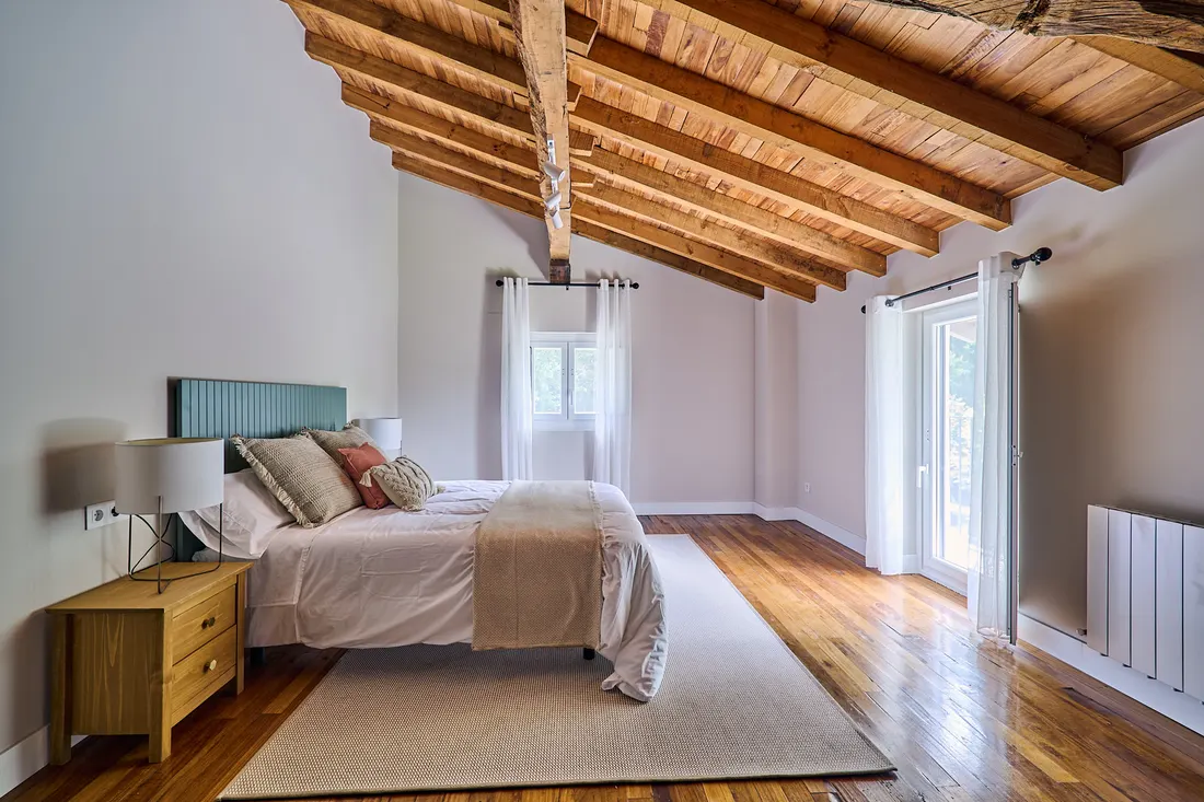 Photo: bedroom, vaulted wood ceiling