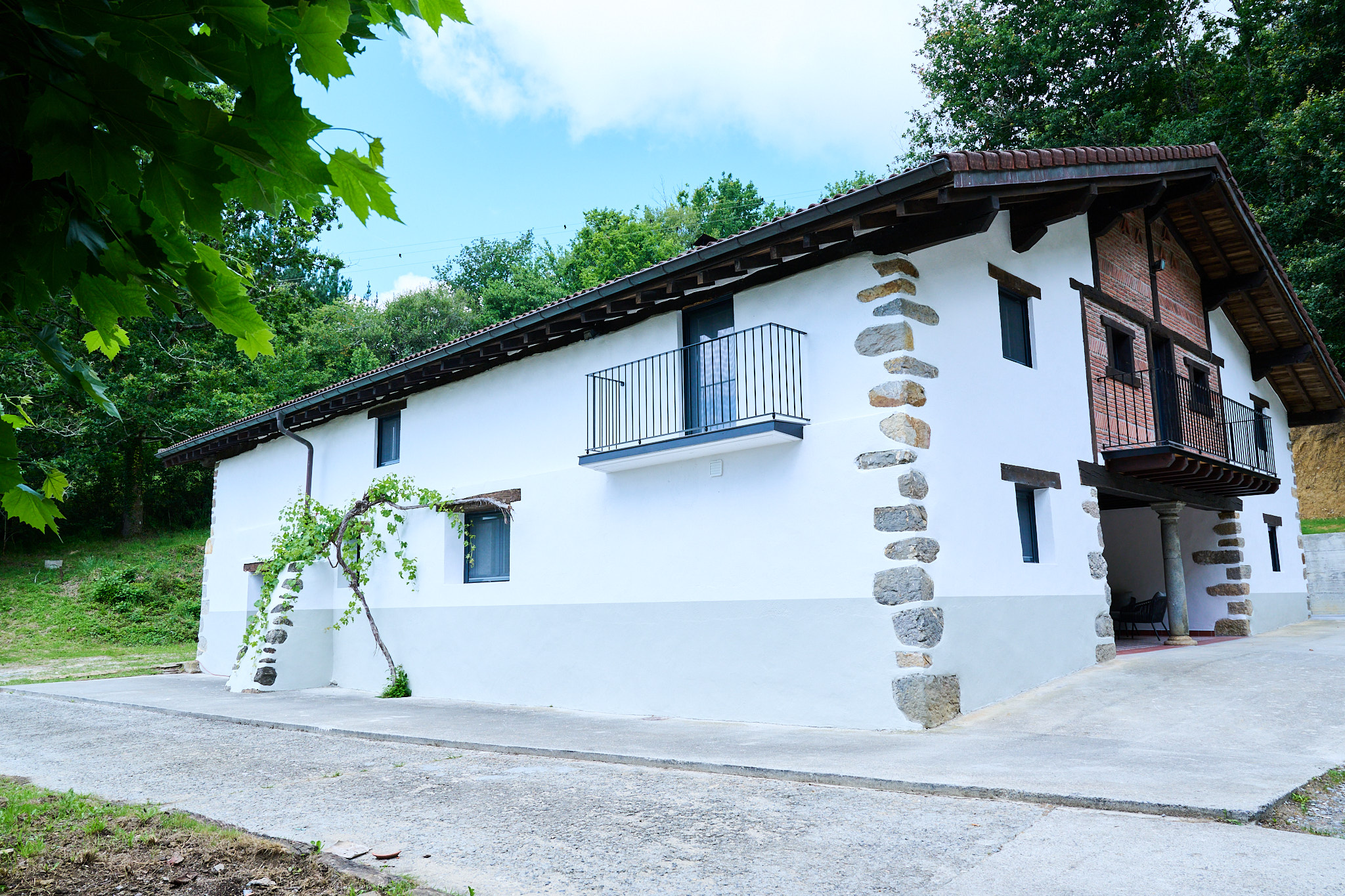 Photo: exterior, house among trees