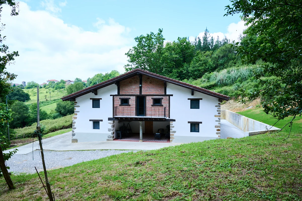 The house among the trees, river-side