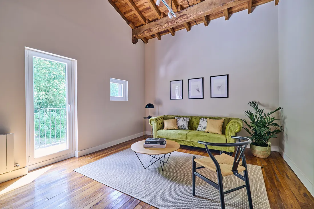 Photo: living room, green chesterfield